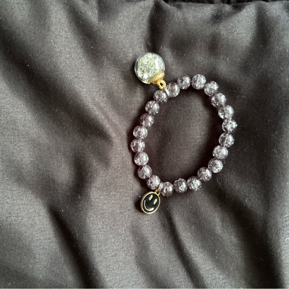 Purple Beaded Bracelet with Smiley Charm